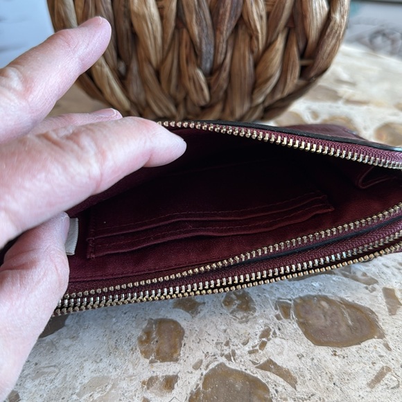 Coach double zipper wallet in burgundy pebbled leather. Measures 6 1/2” x 4”. - Picture 3 of 5